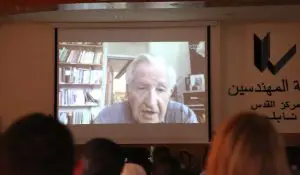 Noam Chomsky speaking via Skype to the first in a series of conferences titled "100 Global Thinkers in Palestine". (Witness Center for Citizen Rights and Social Development)
