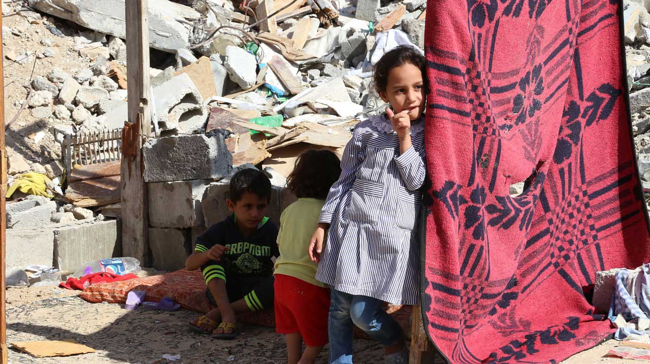 Children in the Gaza Strip. Gazans have been largely unable to rebuild from the devastation of three major Israeli military operations due to Israel's ongoing illegal blockade (Photo: public domain)