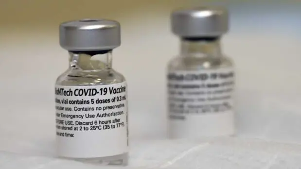 Vials of Pfizer's COVID-19 vaccine (Photo by US Department of Defense, licensed under CC BY 2.0)