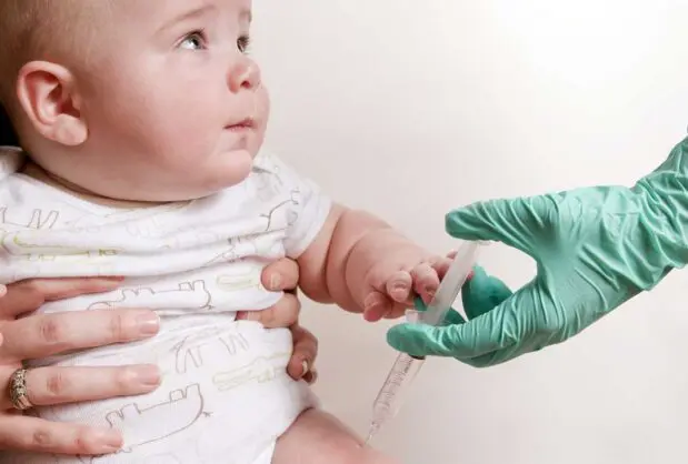 A baby receives an intramuscular vaccination in his right thigh (Public Domain photo by Amanda Mills, CDC, courtesy of Pixnio).