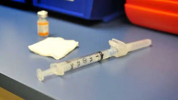 A tetanus, diphtheria, and pertussis vaccine is prepared for a patient at Cannon Air Force Base, NM< on May 29, 2012. (Photo by Defense Visual Information Distribution Service, Public Domain)
