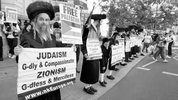 Anti-Zionist Orthodox Jews in London commemorate "Al Nabka" ("The Catastrophe", which is the Palestinians' name for the ethnic cleansing of Palestine in 1948), on May 14, 2022 (Photo by Alisdare Hickson, licensed under CC BY-SA 2.0 DEED)